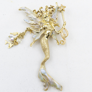 lot 295 image: Kirks Folly Sea Fairy Enamel Gold Tone Base Metal Brooch .