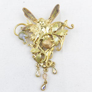 lot 297 image: Kirks Folly Fairy With Strawberries Gold Tone Base Metal Brooch .