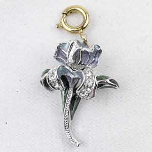 lot 300A image: Nolan Miller Blue Enamel Iris silver tone Base Metal charm.
