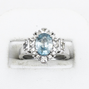lot 313 image: Bangkok Ratnaraj Jewelers Blue Zircon Rhodium Over Sterling Silver Ring. Estimated Replacement Value $200. Size 5.75 - 6.