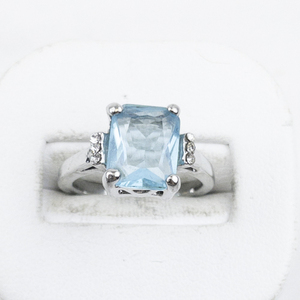 lot 324 image: Aquamarine And CZ Silver Plated Ring. Size 6.25 - 6.5.