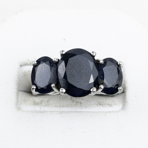 lot 328 image: BJ  Three Stone 5.25Ctw Oval Blue Sapphire Sterling Silver Statement Ring. Estimated Replacement Value $200. Size 6.75 - 7.