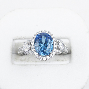 lot 332 image: YELLOW GOLD INC Beautiful Blue & White CZ Sterling Silver Ring. Estimated Replacement Value $150. Size 7 - 7.25.