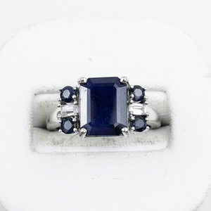 lot 347 image: Bangkok Ratnaraj Jewelers Blue Sapphire Sterling Silver Ring. Size 6.75 - 7.