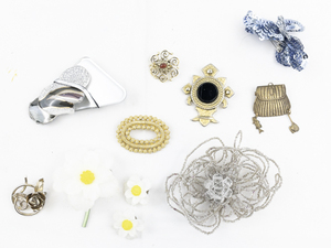 lot 423 image: Group of 11 Base Metal Brooches.