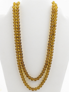 lot 512 image: Amber Double-Strand Bead Necklace. New Old Stock -Estimated Replacement Value $200