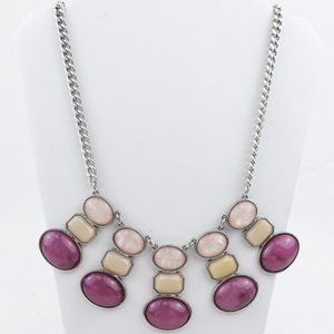 lot 553 image: Pink Silver Tone Base Metal Bib Necklace.