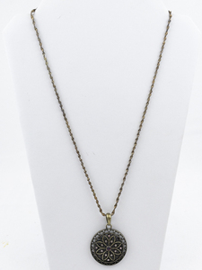 lot 557 image: Purple Rhinestone Accented Flower Base Metal Pendant Necklace .