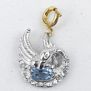 lot 300B image: Nolan Miller Rhinestone Accented Swan Aquamarine silver tone Base Metal charm.