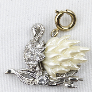 lot 300C image: Nolan Miller Rhinestone Accented Swan silver tone Base Metal charm.