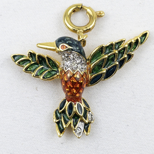 lot 300H image: Nolan Miller Colorful Rhinestone & Enamel Hummingbird gold tone Base Metal charm.
