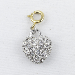 lot 300I image: Nolan Miller White Rhinestone Accented Heart silver tone Base Metal charm.