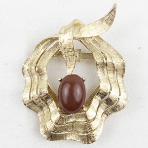 lot 393 image: Textured Red Cabochon Gemstone Gold Tone Base Metal Brooch .