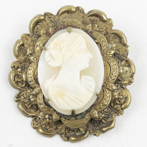 lot 401 image: Vintage Carved White Cameo Gold Tone Base Metal Brooch .
