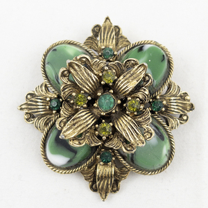 lot 403 image: Green Rhinestone Flower Brooch Gold Tone Base Metal Brooch .