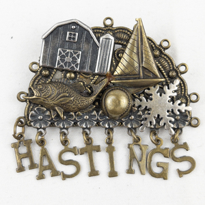 lot 406 image: Hastings Minnesota Base Metal Brooch .