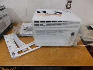 lot 21 image: GE 6,000 BTU 115-Volt Window Air Conditioner for 250 sq. ft. Rooms in White with Remote