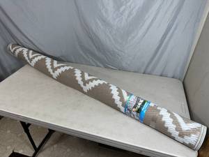 lot 24 image: New 7 ft x 5 ft Outdoor Rug