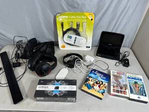 lot 38 image: Assorted Electronics, DVD Player, HDMI Cord, Wireless Headset, and More