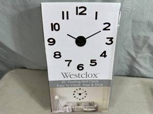 lot 74 image: New 20 inch Floating Wall Clock - Peel and Stick