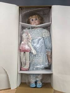 lot 137 image: New Premiere Collection Porcelain Doll Bunny B