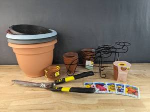 lot 108 image: New Assortment of Gardening Supplies Planters, Flower Seeds, Hedge Clippers and More N