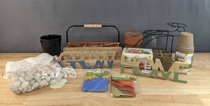 lot 109 image: New Gardening Supplies and Decor Seed Starter Pots, Garden Flags, Rock and Pebble Filler and More N