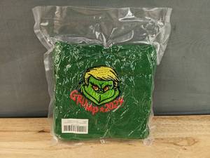 lot 51A image: 2 Brand New Green Grinch Trump Hand Towels - GRUMP 2024 N
