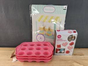 lot 167 image: Brand New Wilton Candy Activity Kit, Paper Treat Cart Stand, and Silicone Sunday Topping Trays N