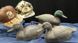 lot 19 image: VINTAGE CANOE MAP AND HARD PLASTIC UNMARKED VINTAGE DECOYS WITH BONUS HATS