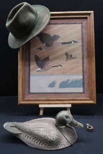 lot 28 image: VINTAGE DECOY, CABELAS HAT, AND PRINT