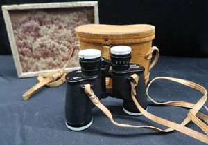 lot 35 image: VINTAGE SWIFT BINOCULARS