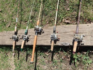 lot 49 image: VINTAGE BAIT CASTERS AND RODS