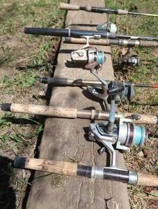 lot 55 image: VINTAGE FISHING RODS AND SPINNING REELS