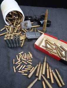 lot 71 image: .300 SAVAGE REPLACEMENT CLIP, LOTS OF BRASS AND ASSORTED AMMO PLUS EXTRAS & BONUS BELT BUCKLE