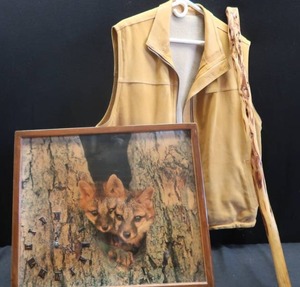lot 77 image: LINED LEATHER VEST, DIAMOND WILLOW CANE, FOX CLOCK, AND OTHER GOODIES