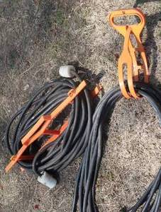 lot 102 image: BLACK EXTENSION CORD AND WORK LIGHT