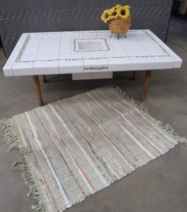 lot 128 image: INDOOR  OUTDOOR TILE COVERED COFFEE TABLE