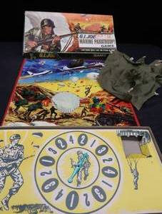 lot 152 image: VINTAGE G.I. JOE MARINE PARATROOP GAME  BONUS UNBRANDED ARMY TRUCKS AND G.I. JOE PUP TENT