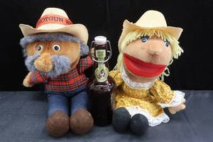 lot 197 image: SHOTGUN RED COWBOY AND COWGIRL DOLL  BONUS VINTAGE BEER BOTTLE