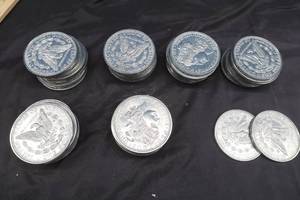 lot 210 image: 62- 3 FAKE NOVELTY SILVER DOLLAR COINS 1884