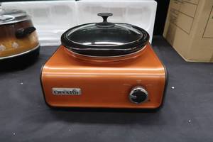lot 218 image: 1- NEW CROCK POT, 1 USED CROCK POT