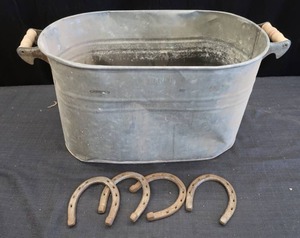 lot 264 image: HORSE SHOES AND GALVINIZED ALUMINUM WASH TUB