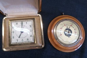lot 276 image: VINTAGE BAROMETER AND TRAVEL ALARM CLOCK