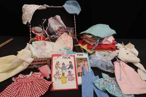lot 285 image: VINTAGE BABY AND DOLL CLOTHES