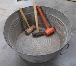 lot 330 image: GALVANIZED WASH TUB WITH VINTAGE MALLETS