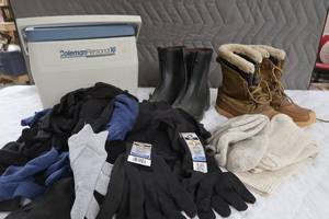 lot 359 image: COOLER FULL OF GLOVES, WOOL SOCKS AND BOOTS