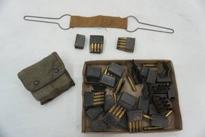 lot 127 image: Empty Brass, First Aid Field Kit, shell holder clips