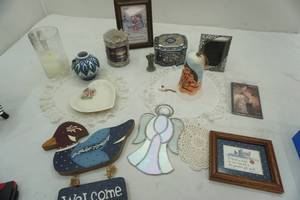 lot 139 image: Decor Lot Ceramic Bell, picture frames, tin, and more