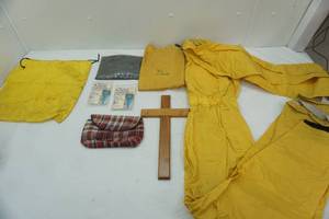 lot 185 image: Raingear, ponchos, wooden cross, vintage bag